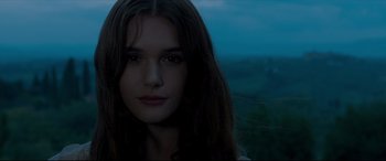 Movie still from “The Face of an Angel” (2014), directed by Michael Winterbottom – A person with long hair; Close Up shot, Low angle