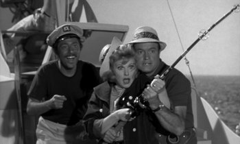 Movie still from “The Facts of Life” (1960), directed by Melvin Frank – A black - and - white photo of a woman holding a fishing rod; Medium shot, High angle