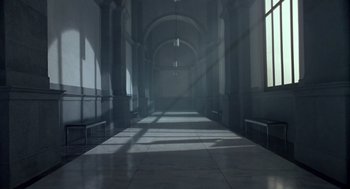 Movie still from “The Falcon and the Snowman” (1985), directed by John Schlesinger – A long hallway with a lot of light coming in from the windows; Extreme Wide shot, Low angle