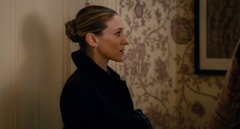 Movie still from “The Family Stone” (2005), directed by Thomas Bezucha – A woman in a black coat looking to the side; Close Up shot, Over the shoulder angle