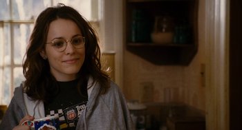 Movie still from “The Family Stone” (2005), directed by Thomas Bezucha – A woman wearing glasses standing in a kitchen; Close Up shot, Over the shoulder angle