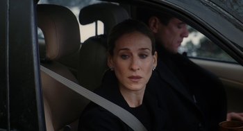 Movie still from “The Family Stone” (2005), directed by Thomas Bezucha – A man and a woman sitting in the back seat of a car; Close Up shot, Over the shoulder angle