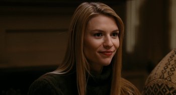 Movie still from “The Family Stone” (2005), directed by Thomas Bezucha – A person with long blonde hair; Close Up shot, Low angle