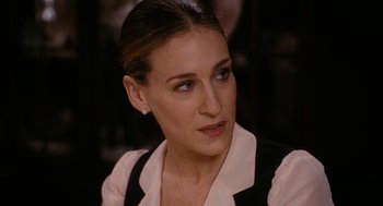 Movie still from “The Family Stone” (2005), directed by Thomas Bezucha – A person wearing a dress shirt and tie; Close Up shot, Over the shoulder angle