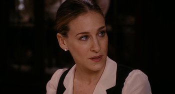 Movie still from “The Family Stone” (2005), directed by Thomas Bezucha – A person wearing a dress shirt and tie; Close Up shot, Over the shoulder angle