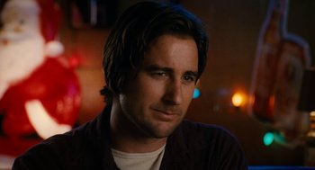 Movie still from “The Family Stone” (2005), directed by Thomas Bezucha – A person with long hair; Close Up shot, Over the shoulder angle