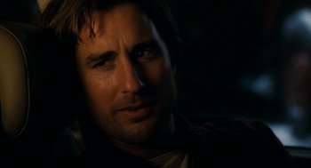 Movie still from “The Family Stone” (2005), directed by Thomas Bezucha – A person looking at the camera; Close Up shot, Over the shoulder angle