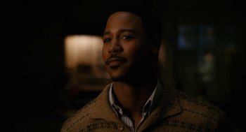 Movie still from “The Family Stone” (2005), directed by Thomas Bezucha – A person wearing a sweater; Close Up shot, High angle