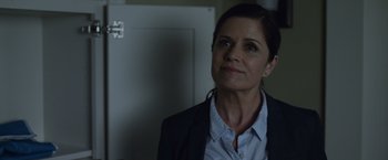 Movie still from “Gone Girl” (2014), directed by David Fincher – A person wearing a jacket; Close Up shot, Over the shoulder angle