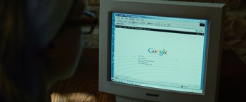 Movie still from “Gone Girl” (2014), directed by David Fincher – A computer screen showing a google page on it; Extreme Close Up shot, High angle