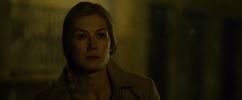 Movie still from “Gone Girl” (2014), directed by David Fincher – A person wearing a jacket; Close Up shot, Low angle