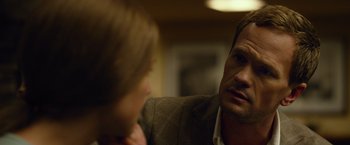 Movie still from “Gone Girl” (2014), directed by David Fincher – A man and a woman are talking to each other; Close Up shot, Over the shoulder angle