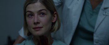 Movie still from “Gone Girl” (2014), directed by David Fincher – A person with blood on her face; Close Up shot, Over the shoulder angle