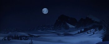 Movie still from “The Fearless Vampire Killers” (1967), directed by Roman Polanski – A full moon rises over a snowy mountain; Extreme Wide shot, Low angle