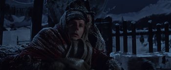Movie still from “The Fearless Vampire Killers” (1967), directed by Roman Polanski – A man in a fur coat and a woman wrapped in a blanket in the snow; Close Up shot, Low angle