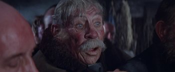 Movie still from “The Fearless Vampire Killers” (1967), directed by Roman Polanski – An old man with a beard and a mustache; Close Up shot, Low angle
