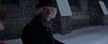 Movie still from “The Fearless Vampire Killers” (1967), directed by Roman Polanski – An old man in a top hat and a scarf; Close Up shot, Over the shoulder angle
