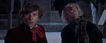 Movie still from “The Fearless Vampire Killers” (1967), directed by Roman Polanski – A man and a woman dressed up in costumes; Close Up shot, Low angle