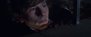 Movie still from “The Fearless Vampire Killers” (1967), directed by Roman Polanski – A person looking at the camera; Close Up shot, High angle