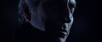 Movie still from “The Fearless Vampire Killers” (1967), directed by Roman Polanski – A man's face in the dark; Extreme Close Up shot, Low angle