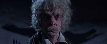 Movie still from “The Fearless Vampire Killers” (1967), directed by Roman Polanski – An old man with a white wig and a beard; Close Up shot, Low angle