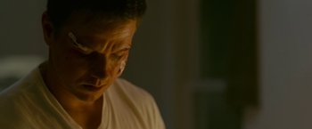 Movie still from “The Fighter” (2010), directed by David O. Russell – A person wearing a white shirt; Close Up shot, High angle