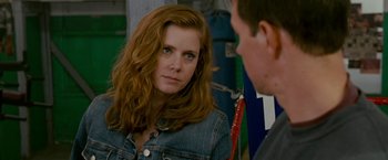 Movie still from “The Fighter” (2010), directed by David O. Russell – A man and a woman talking to each other; Close Up shot, Over the shoulder angle