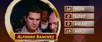 Movie still from “The Fighter” (2010), directed by David O. Russell – Two men and a woman in front of a red and gold background; Close Up shot, Overhead angle