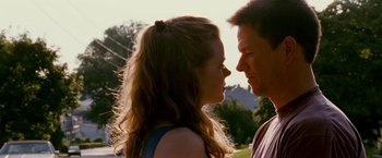 Movie still from “The Fighter” (2010), directed by David O. Russell – A man and a woman face to face in a field; Close Up shot, Low angle