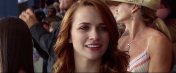 Movie still from “The Final Destination” (2009), directed by David R. Ellis – A woman with red hair; Close Up shot, Over the shoulder angle