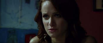 Movie still from “The Final Destination” (2009), directed by David R. Ellis – A person with red hair; Close Up shot, Over the shoulder angle