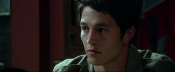 Movie still from “The Final Destination” (2009), directed by David R. Ellis – A person looking at the camera; Close Up shot, Over the shoulder angle