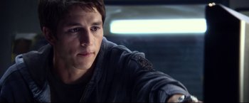 Movie still from “The Final Destination” (2009), directed by David R. Ellis – A person wearing a jacket; Close Up shot, Over the shoulder angle