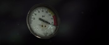 Movie still from “The Final Destination” (2009), directed by David R. Ellis – A broken air pressure gauge; Extreme Close Up shot, Low angle