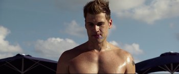 Movie still from “The Final Destination” (2009), directed by David R. Ellis – A shirtless man with a toothbrush in his mouth; Close Up shot, Low angle