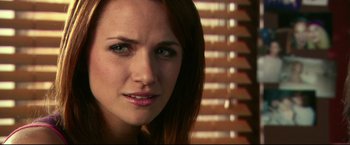 Movie still from “The Final Destination” (2009), directed by David R. Ellis – A woman's face in front of a window; Close Up shot, Over the shoulder angle