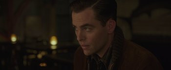 Movie still from “The Finest Hours” (2016), directed by Craig Gillespie – A person wearing a jacket; Close Up shot, Over the shoulder angle