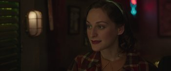 Movie still from “The Finest Hours” (2016), directed by Craig Gillespie – A person wearing a plaid shirt; Close Up shot, Over the shoulder angle