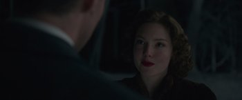 Movie still from “The Finest Hours” (2016), directed by Craig Gillespie – A woman sitting next to a man in a car; Close Up shot, Over the shoulder angle