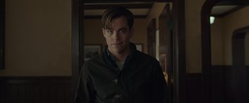 Movie still from “The Finest Hours” (2016), directed by Craig Gillespie – A person wearing a jacket; Close Up shot, Over the shoulder angle