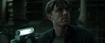 Movie still from “The Finest Hours” (2016), directed by Craig Gillespie – A person looking up at the sky; Close Up shot, Low angle