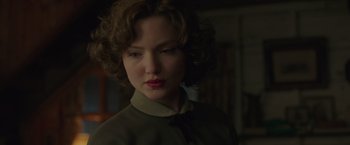 Movie still from “The Finest Hours” (2016), directed by Craig Gillespie – A person with curly brown hair; Close Up shot, Low angle