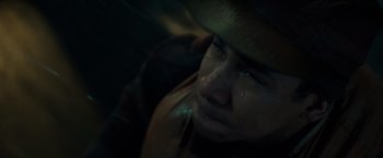 Movie still from “The Finest Hours” (2016), directed by Craig Gillespie – A person wearing a hat; Extreme Close Up shot, High angle
