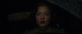 Movie still from “The Finest Hours” (2016), directed by Craig Gillespie – A woman with red lipstick is looking at the camera; Close Up shot, Low angle
