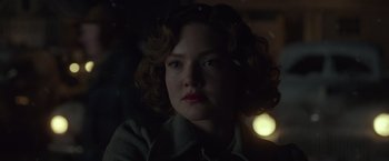 Movie still from “The Finest Hours” (2016), directed by Craig Gillespie – A person with curly hair; Close Up shot, Over the shoulder angle