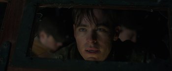 Movie still from “The Finest Hours” (2016), directed by Craig Gillespie – A person looking through a window; Close Up shot, Over the shoulder angle