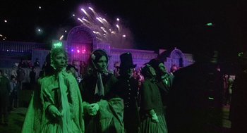 Movie still from “The Great Train Robbery” (1978), directed by Michael Crichton – A group of people dressed up in costumes; Wide shot, Low angle