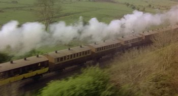 Movie still from “The Great Train Robbery” (1978), directed by Michael Crichton – An aerial view of a train traveling down the tracks; Extreme Wide shot, High angle