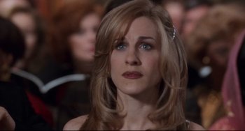 Movie still from “The First Wives Club” (1996), directed by Hugh Wilson – A person with long hair; Close Up shot, Over the shoulder angle