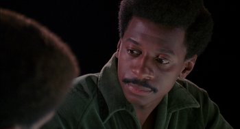 Movie still from “The Five Heartbeats” (1991), directed by Robert Townsend – A person with a beard; Close Up shot, Over the shoulder angle